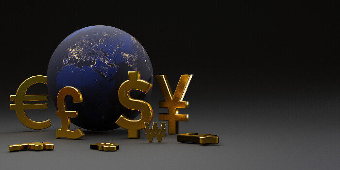 地球儀と各国の通貨が循環するのイメージ